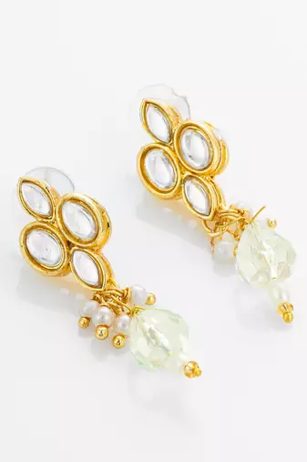 gold plated kundan and pearl drop earrings