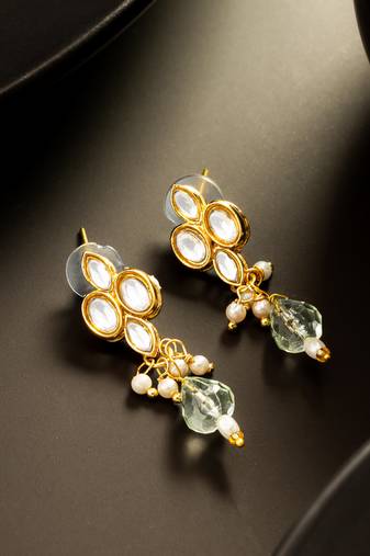 gold plated kundan and pearl drop earrings