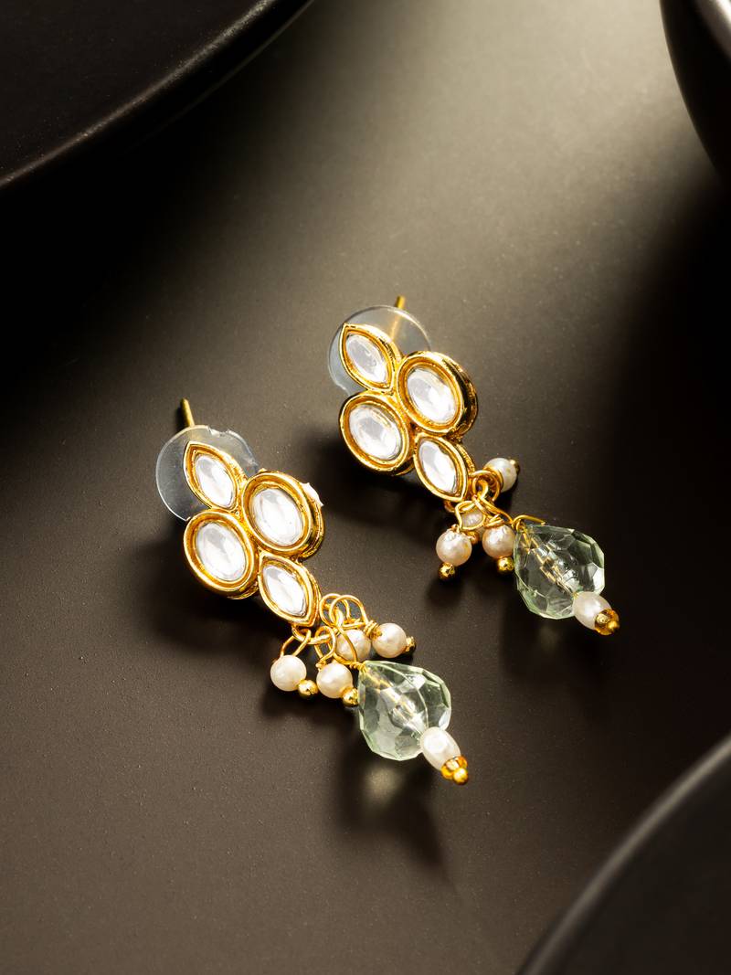 gold plated kundan and pearl drop earrings
