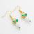 green kundan and pearl floral drop earrings
