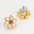 vibrant gold plated white and pink kundan floral studs