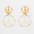 textured gold plated round statement earrings â€“ white marble finish
