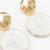 textured gold plated round statement earrings â€“ white marble finish