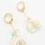 crystal bloom long leaf earrings in gold finish