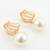 pearl hoop statement earrings