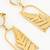 gold plated matte leaf cutout statement earrings