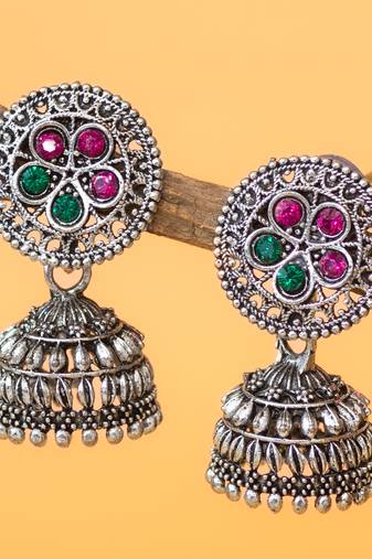 oxidized silver jhumka earrings with circular floral top and multicolour stone