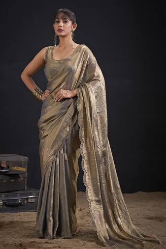 Golden polka butti work tissue silk saree with matching blouse piece