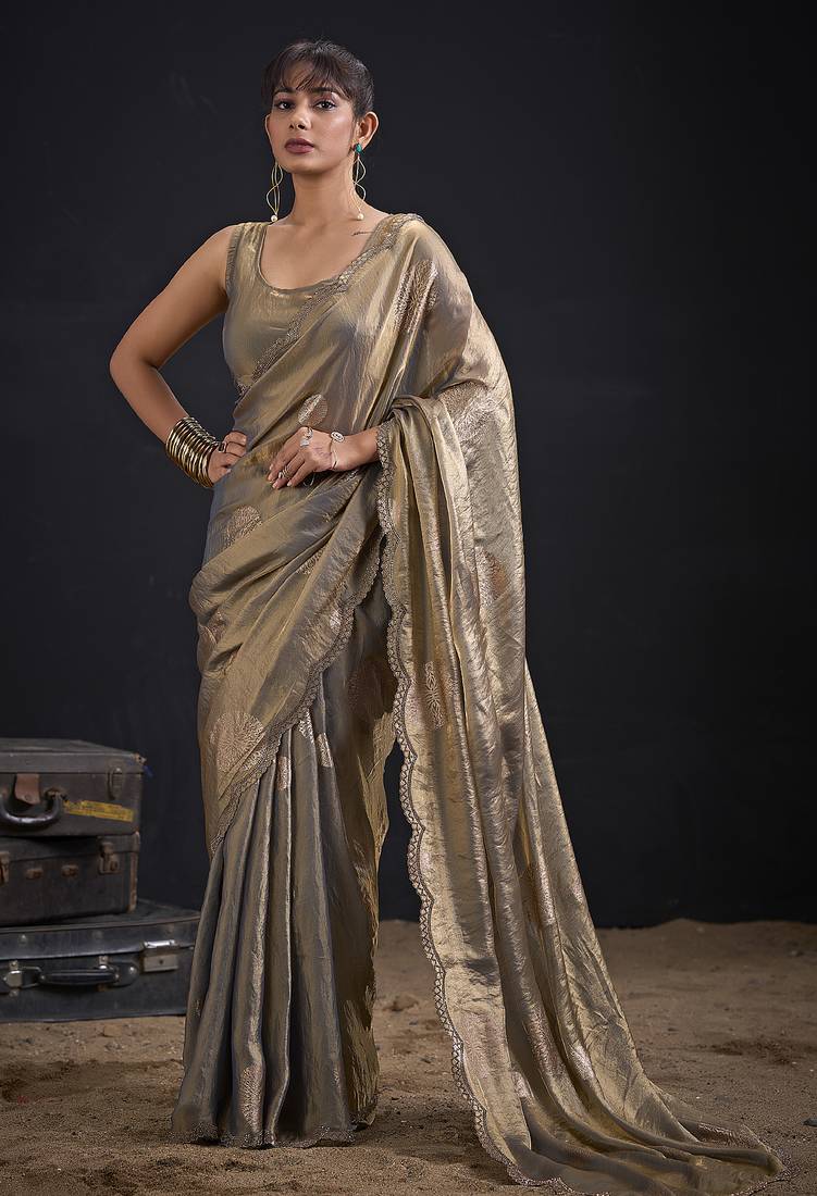 Golden polka butti work tissue silk saree with matching blouse piece