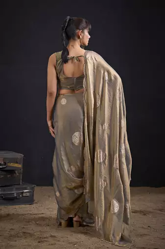 Golden polka butti work tissue silk saree with matching blouse piece