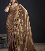 Golden polka butti work tissue silk saree with matching blouse piece