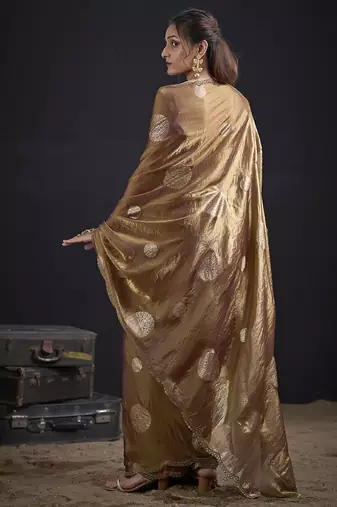 Golden polka butti work tissue silk saree with matching blouse piece
