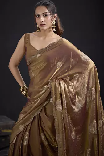 Golden polka butti work tissue silk saree with matching blouse piece