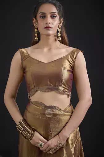 Golden polka butti work tissue silk saree with matching blouse piece