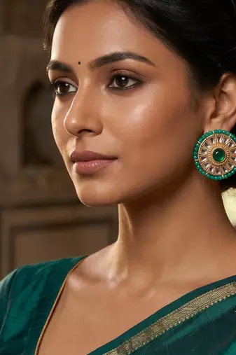 Traditional gold emerald green kundan stud earrings with beaded border for women