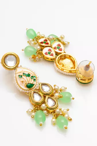 gold plated kundan earrings with meenakari peacock motif and stone drops