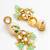 gold plated kundan earrings with meenakari peacock motif and stone drops