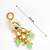 gold plated kundan earrings with meenakari peacock motif and stone drops