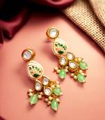 gold plated kundan earrings with meenakari peacock motif and stone drops