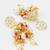 kundan jhumka earrings with baroque pearl drops and pink bead accents