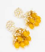 kundan jhumka earrings with yellow oval bead cluster drops