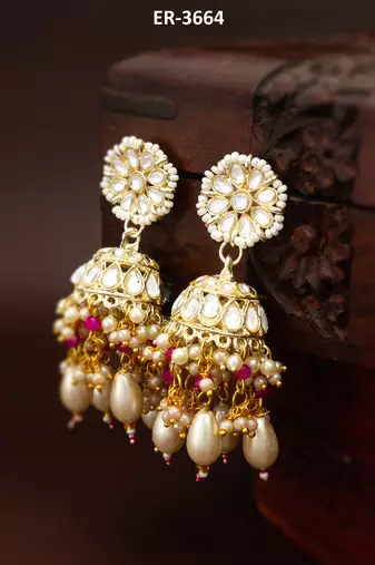 kundan jhumka earrings with baroque pearl drops and pink bead accents