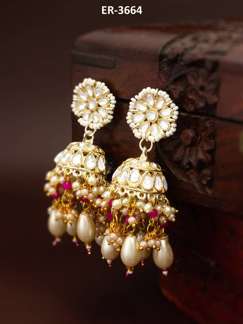 kundan jhumka earrings with baroque pearl drops and pink bead accents