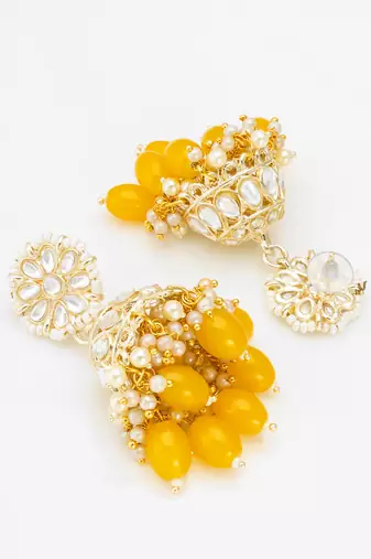 kundan jhumka earrings with yellow oval bead cluster drops