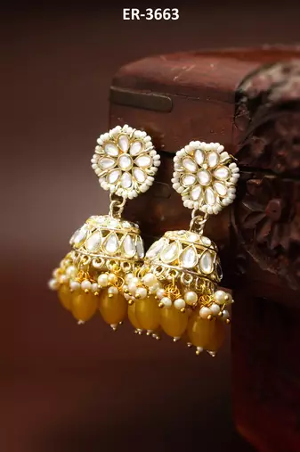 kundan jhumka earrings with yellow oval bead cluster drops