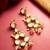 gold-toned kundan stud drop earrings with peach crackle bead drops