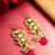 gold-toned kundan drop earrings with pearl cluster and stone