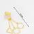 gold-plated multi-shape drop earrings with triangle, square and circle pendants