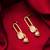 gold-plated oval link drop earrings with stone and pearl