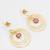 gold-plated circle hoop drop earrings with pink stone