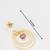 gold-plated circle hoop drop earrings with pink stone