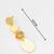 gold-plated multi-disc drop earrings with stone