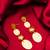 gold-plated multi-disc drop earrings with stone