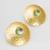 gold-plated hammered disc stud earrings with aqua green stone