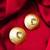 gold-plated hammered disc stud earrings with aqua green stone