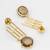gold-plated drop earrings with round smoky stone pendant