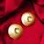 gold-plated hammered disc stud earrings with aqua green stone