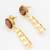 gold-plated spiral coil drop earrings with oval stone stud top