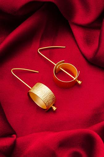 gold-plated textured cylindrical scroll hoop earrings with hook closure