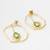 gold-plated octagon frame drop earrings with green stone