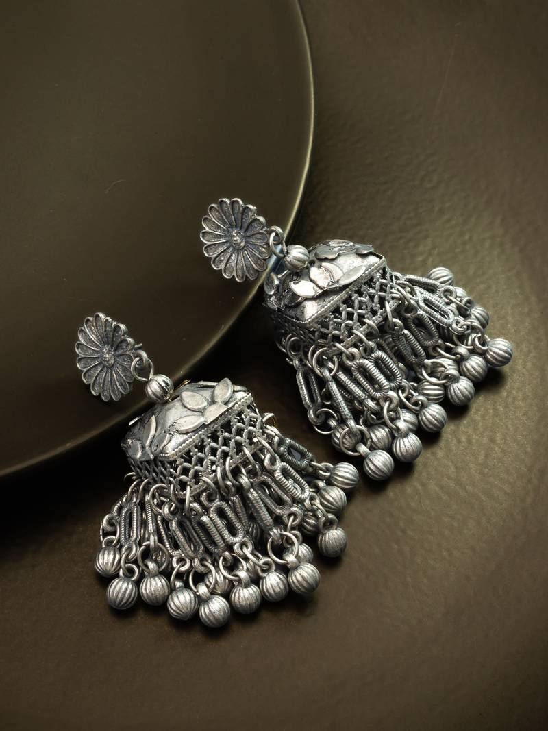 oxidized silver starburst jhumka earrings with ribbed ghungroo fringe and floral stud
