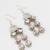 silver-tone kundan chandelier drop earrings with stones and meenakari