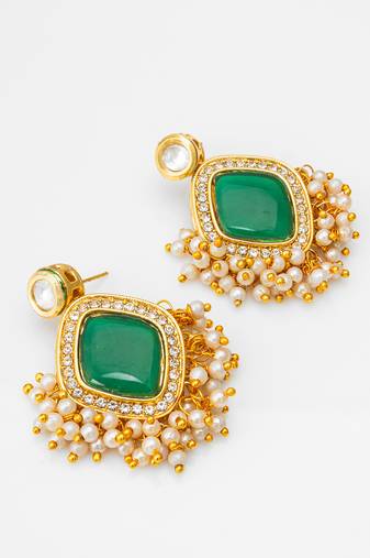 green stone kundan jhumka earrings with pearl