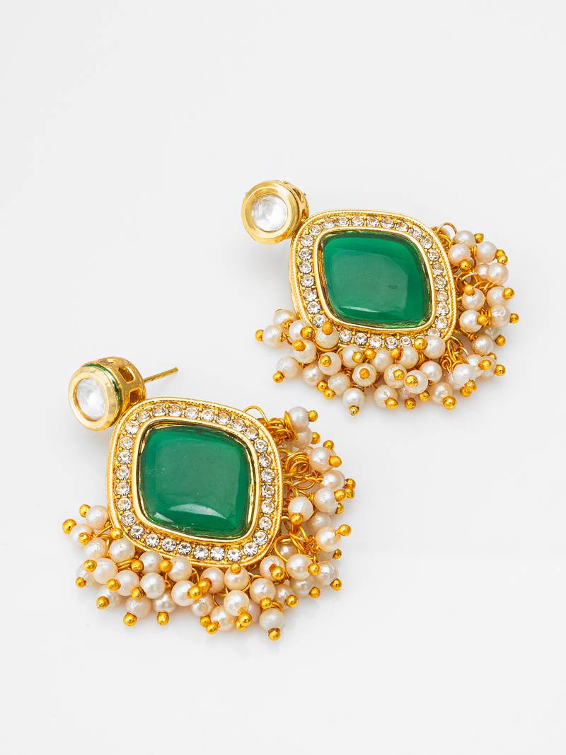 green stone kundan jhumka earrings with pearl