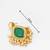 green stone kundan jhumka earrings with pearl