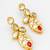Traditional kundan drop earrings with red accent